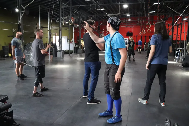 Instructor Ryan leading new students through their 1st class.
