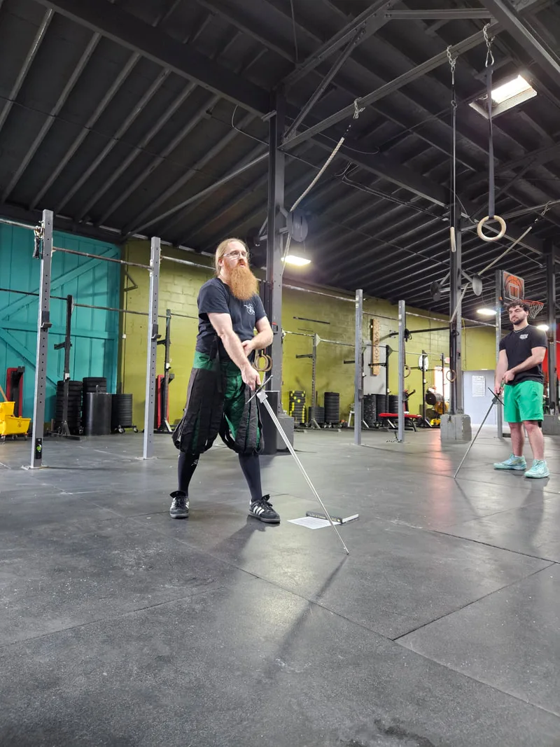 Instructor Jason leading new adult students through a trial class.