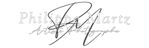 Logo signature minimaliste noir et blanc de l'artiste photographe Philippe Martz