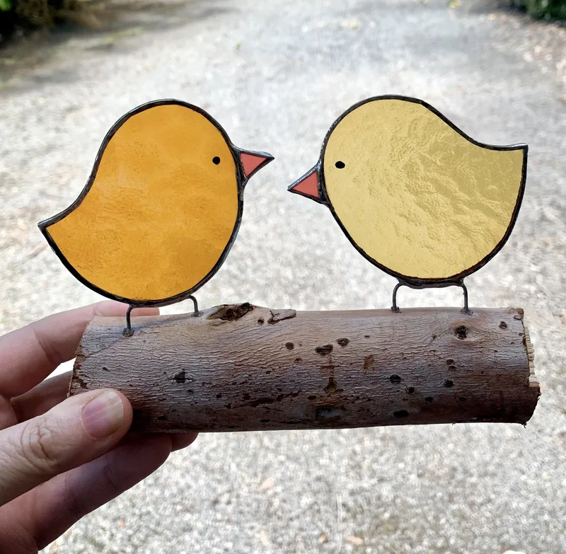Chicks on a log