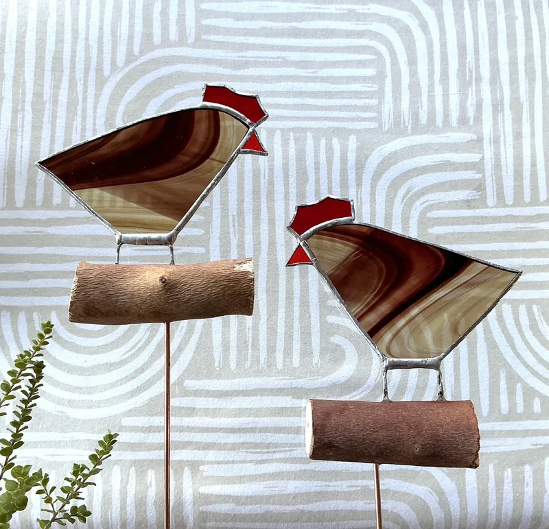 Roosters on sticks