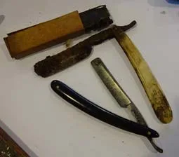 Wonthaggi Museum, straight razors, one restored and one still rusted as found