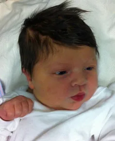 Catherine Lynn Mula born in 2012 with lots of hair.