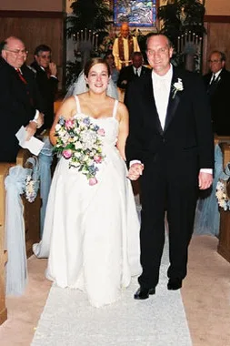 Dawn Marie and Todd leaving the alter after their 2004 wedding.