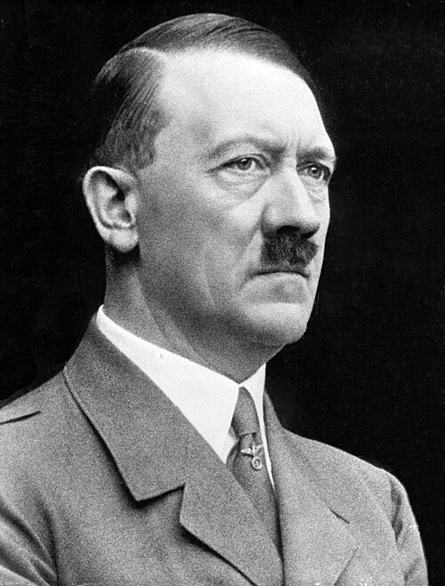 Adolf Hitler, c. 1937. Photo: Bundesarchiv, Bild 183-H1216-0500-002 / CC BY-SA 3.0 DE, via Wikimedia Commons. Cropped and restored by Wikimedia contributors