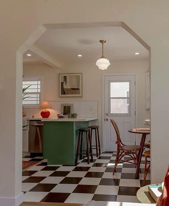 Kitchen designed by Jill Seidner Interior Design with a black and white tile floor