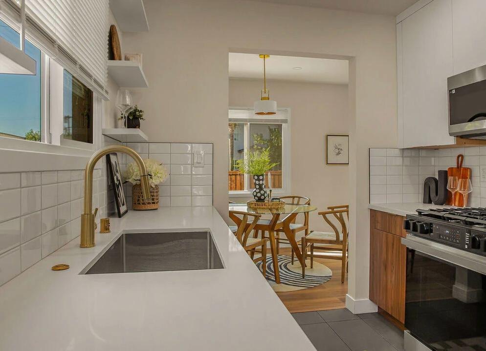 White kitchen looking into the dining nook by Jill Seidner Interior Design