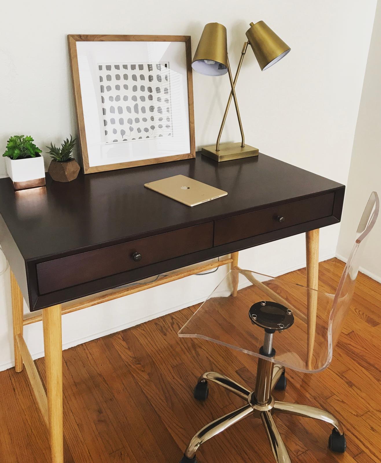 Home office desk with a brass lamp by Jill Seidner Interior Design