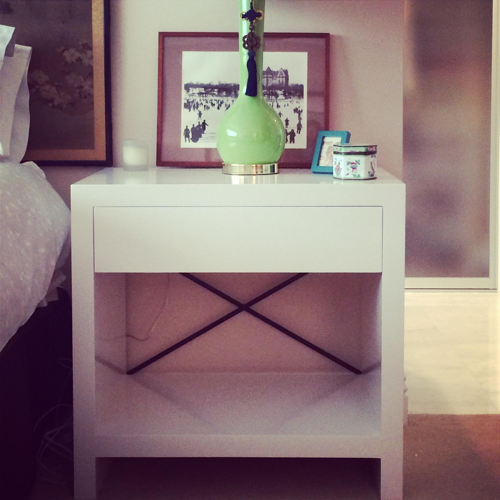 Bedroom nightstand with a green lamp by Jill Seidner Interior Design