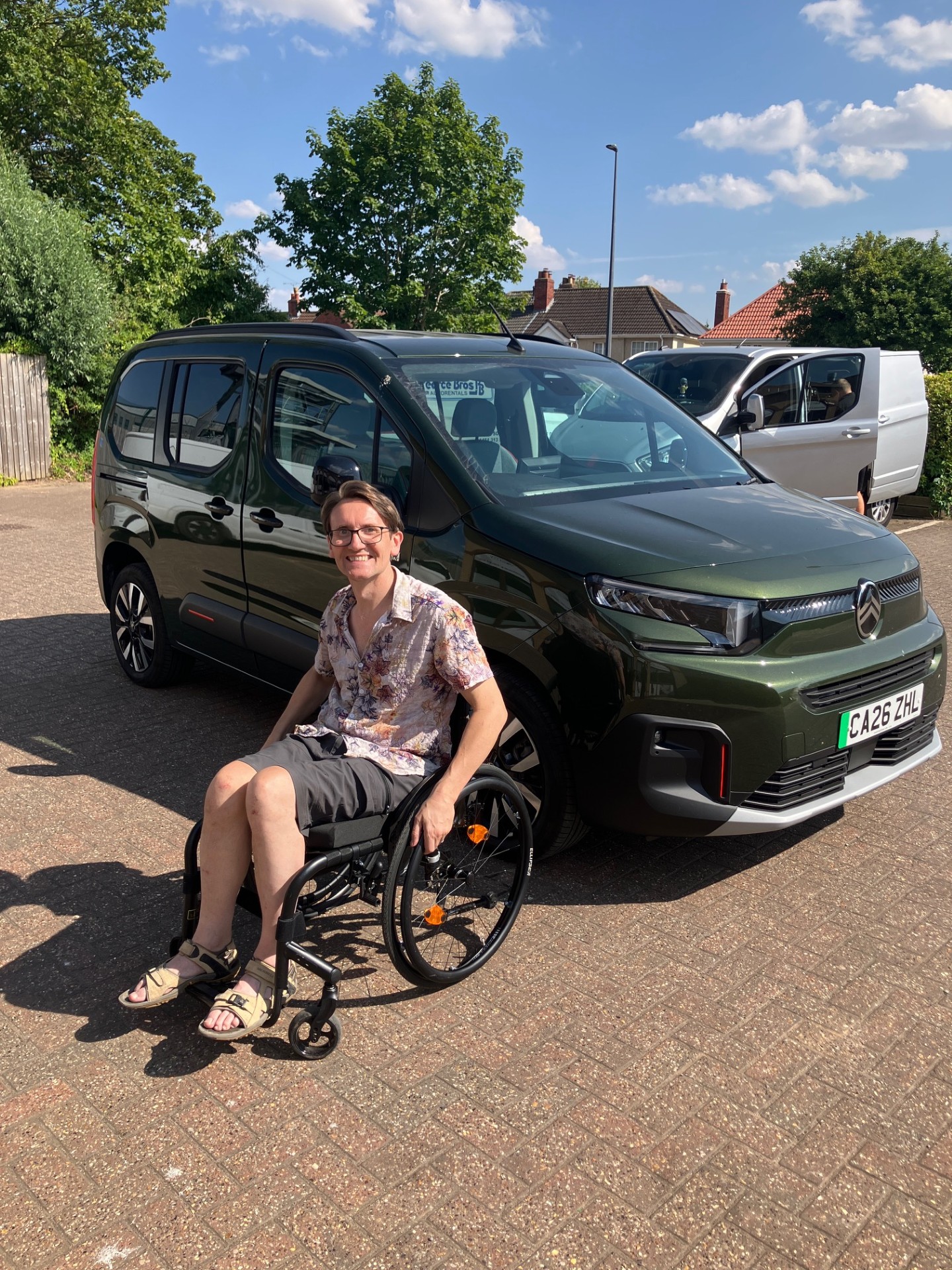 Me with the Batchair and Berlingo, smiling in the sunshine