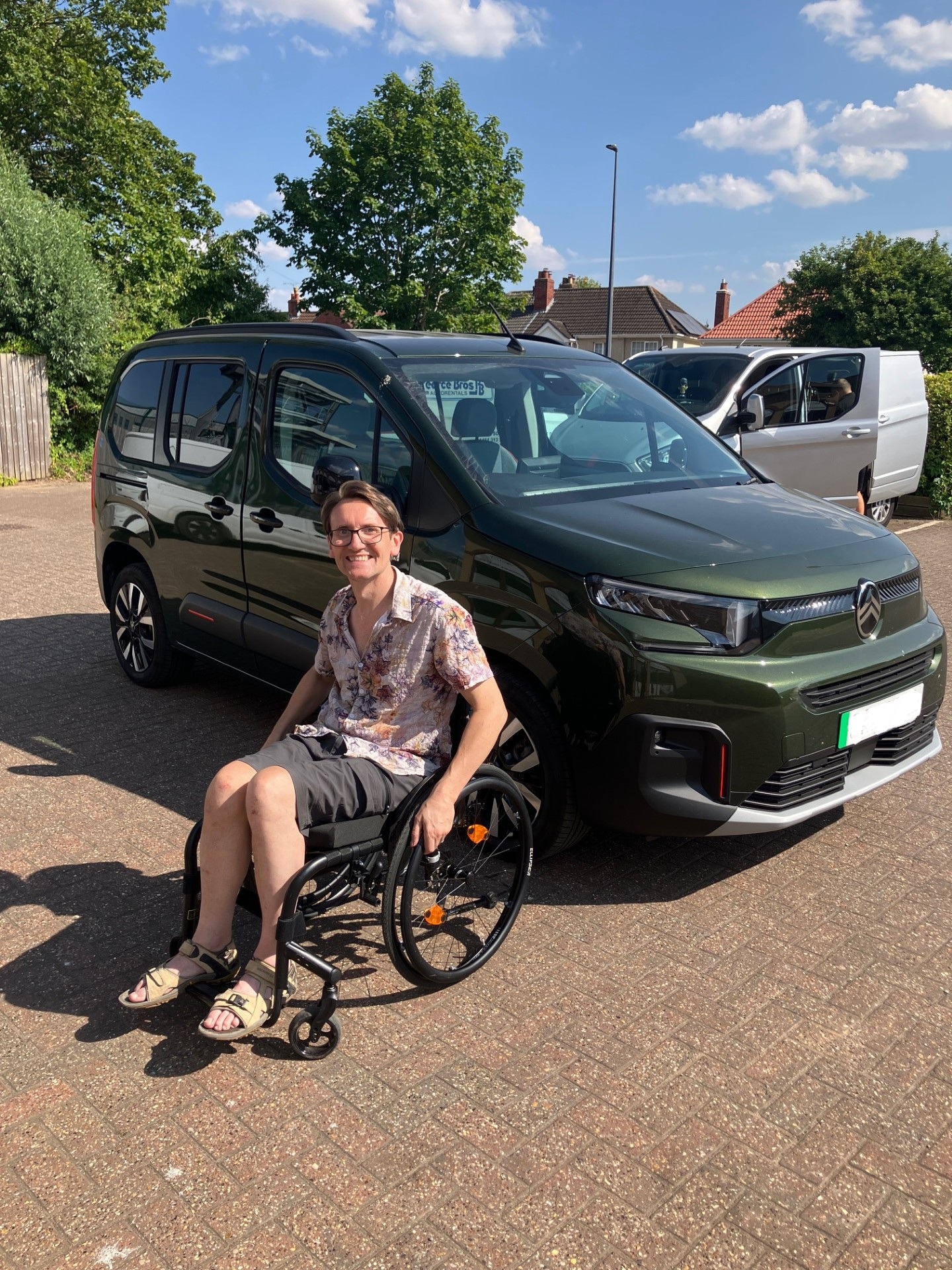 Me with the Batchair and Berlingo, smiling in the sunshine