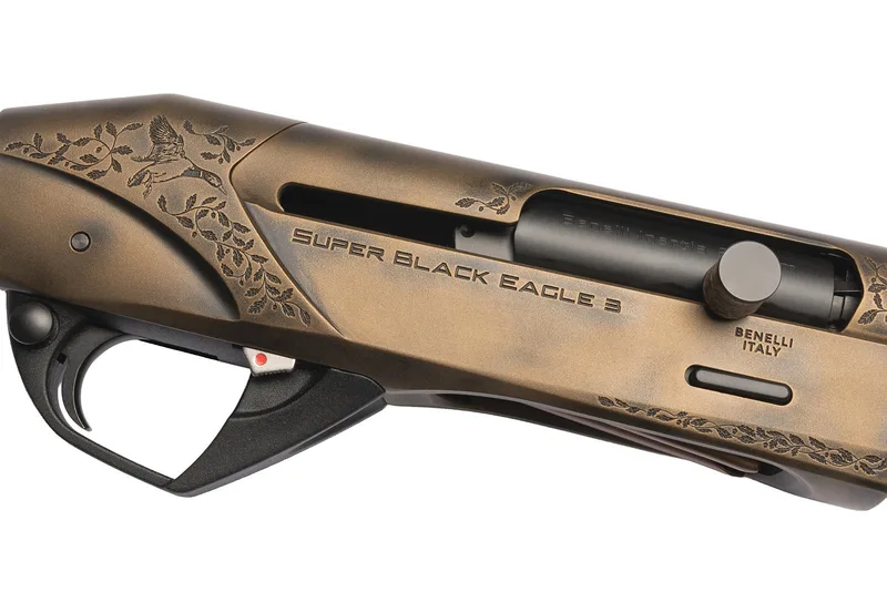 Benelli Super Black Eagle 3 receiver with an Antiqued Cerakote finish and laser-engraved duck and oak leaf artwork by Grumpy Duck Classics