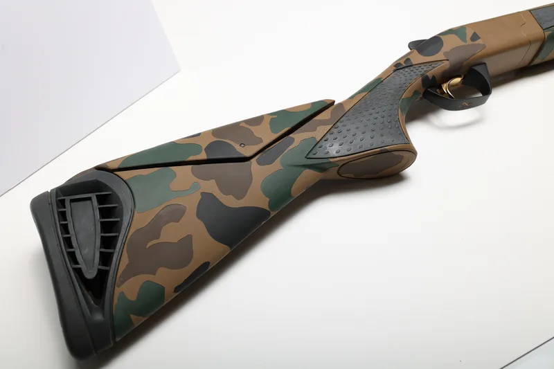 Benelli shotgun stock finished in a classic camo pattern Cerakote