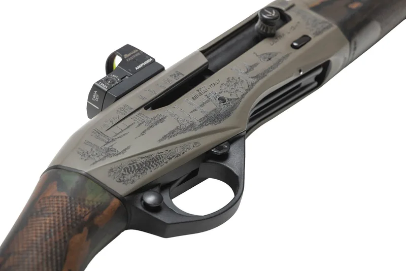 Angled view of the laser-engraved woodland scene on a Custom Grey Cerakote Benelli Ultra Light 20 gauge receiver