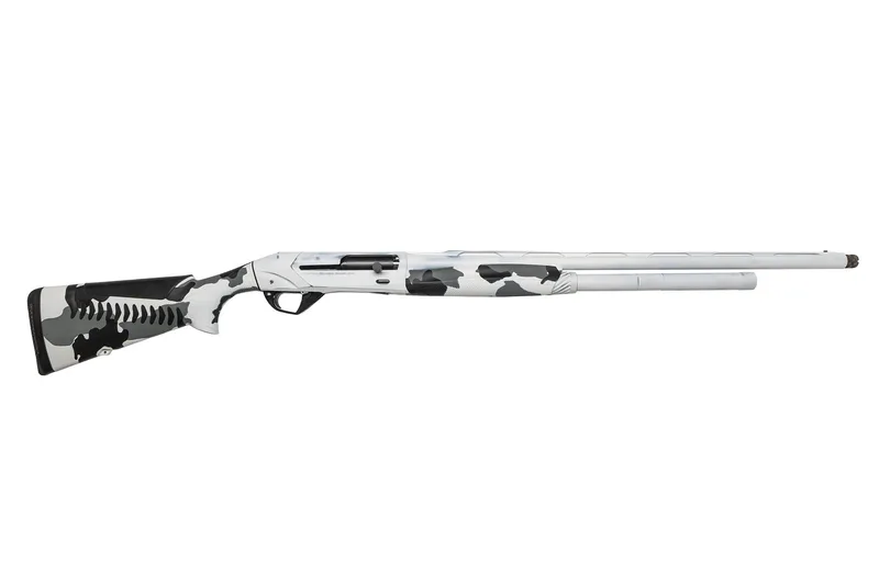 Full-length Benelli Super Black Eagle 3 shotgun with an Antiqued Snow White receiver and barrel and a Cerakote Snow White, Shark Grey and Graphite Black camo stock and forend