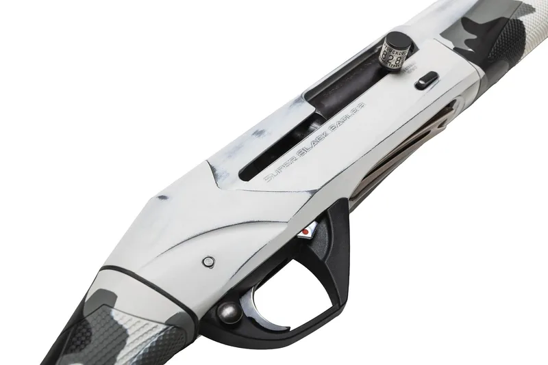Top-down view of an Antiqued Snow White Cerakote receiver on a Benelli Super Black Eagle 3