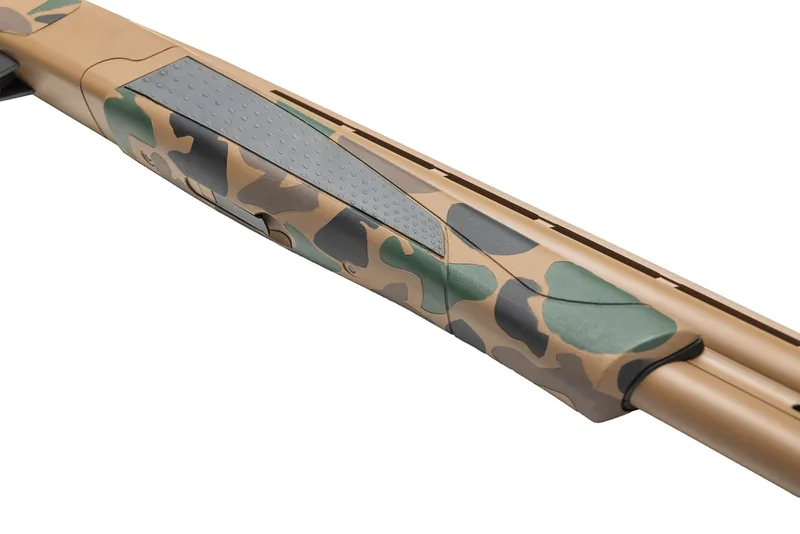 Close-up of a Browning Cynergy 12 gauge forend in a Troy Coyote Tan, Chocolate Brown, Graphite Black and Highland Green Cerakote camo pattern