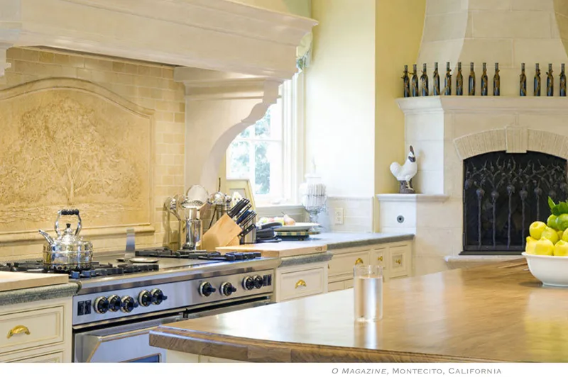 Oprah Winfrey's Promised Land Oak Tree stone carving above her stove top in her Montecito, California Estate from 2003 until 2013. Created by artists Jamie Santaniello and Frank Santaniello. O MAGAZINE   March 2013   Article “Make Room For Me!”  Pages 136-141.  
Photo showing Oprah's kitchen and the Oak Tree Mural, P. 141. jamiesantaniello.com
Copyright©JS2003