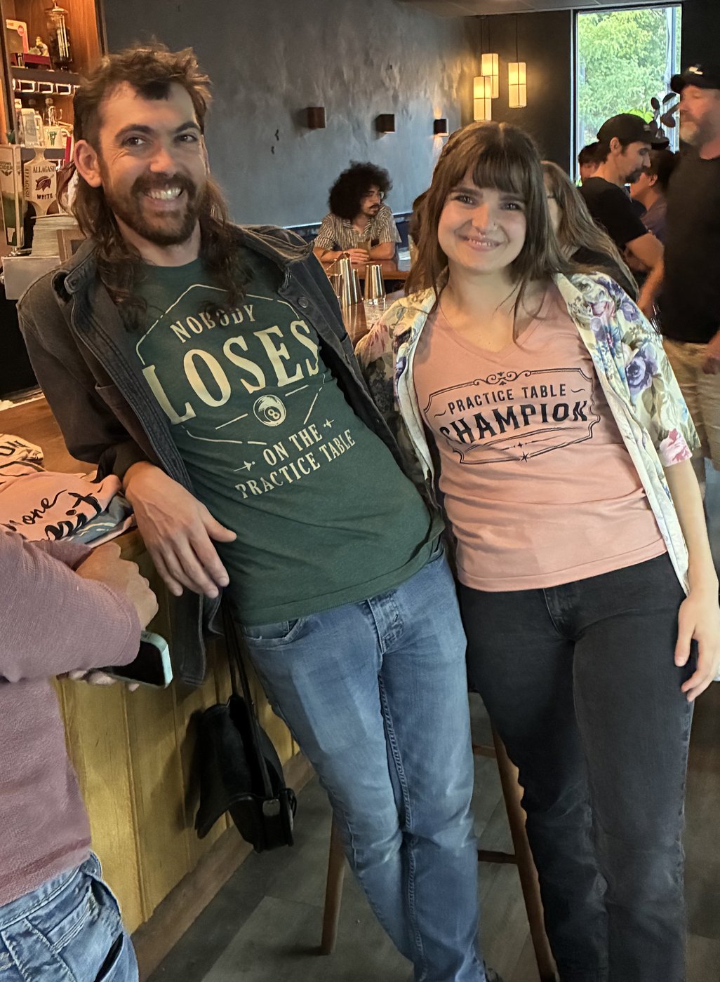 Hannah and Sean in their PTC gear at Tally Bar and Billiards during Tuesday APA league night.