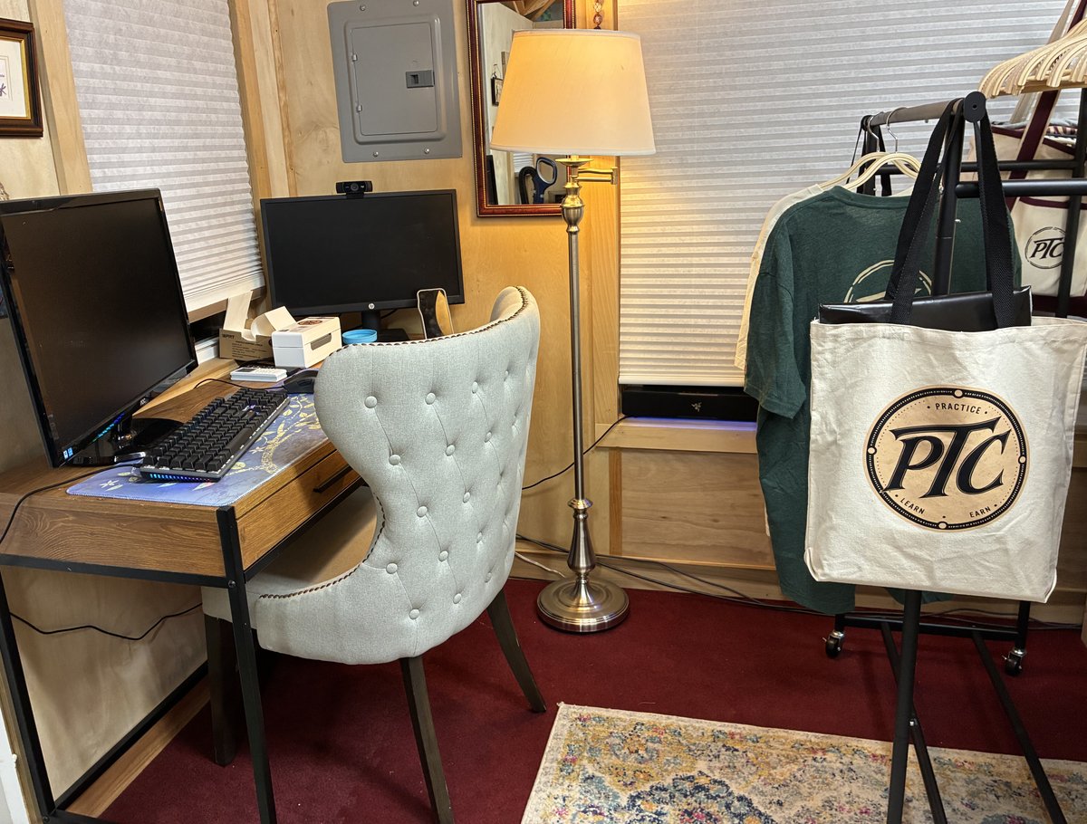 The workspace with garments and PTC totes on the rack.