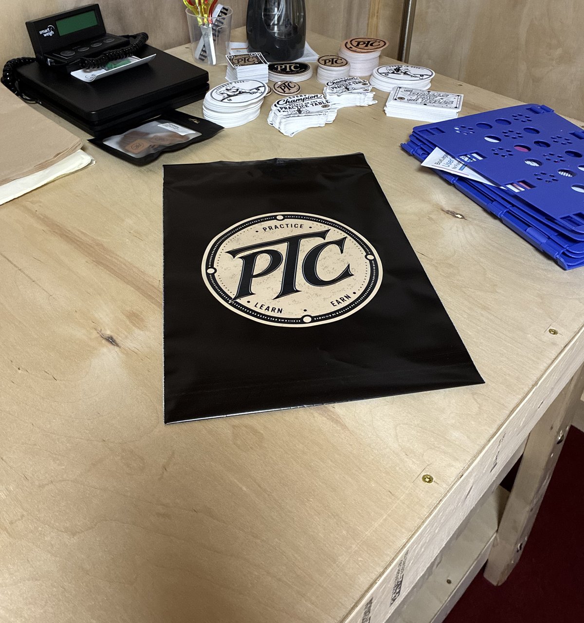 A PTC mailer with the scale, folding boards and packing supplies.