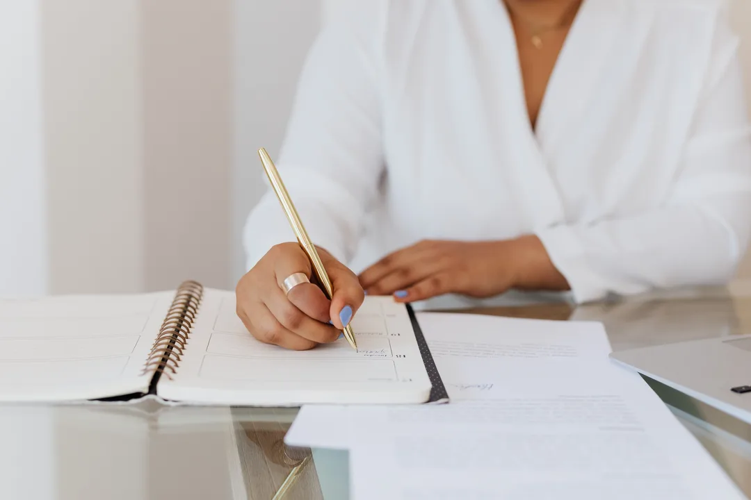 Author writing and preparing a manuscript for publication
