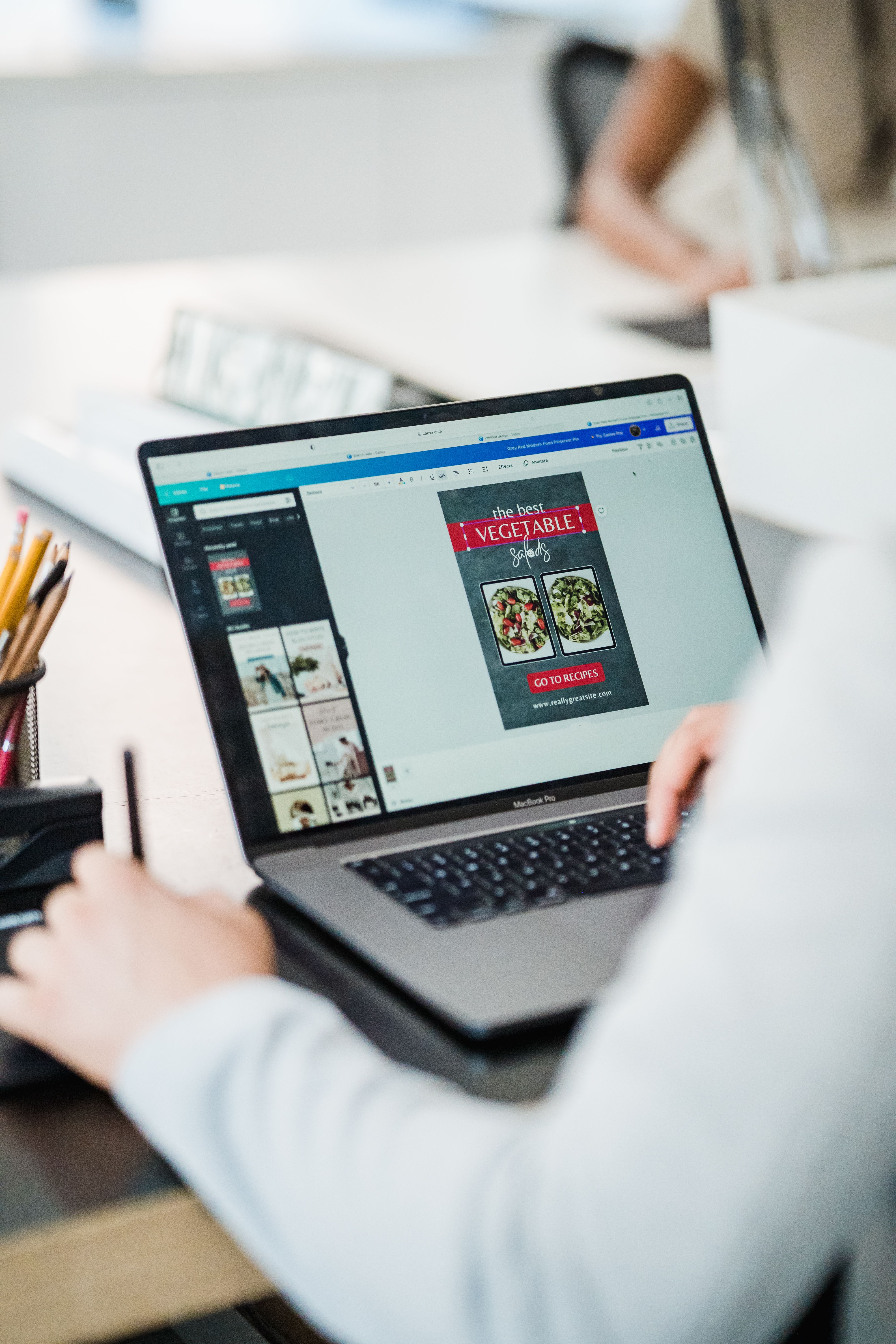Book cover design being created on a computer