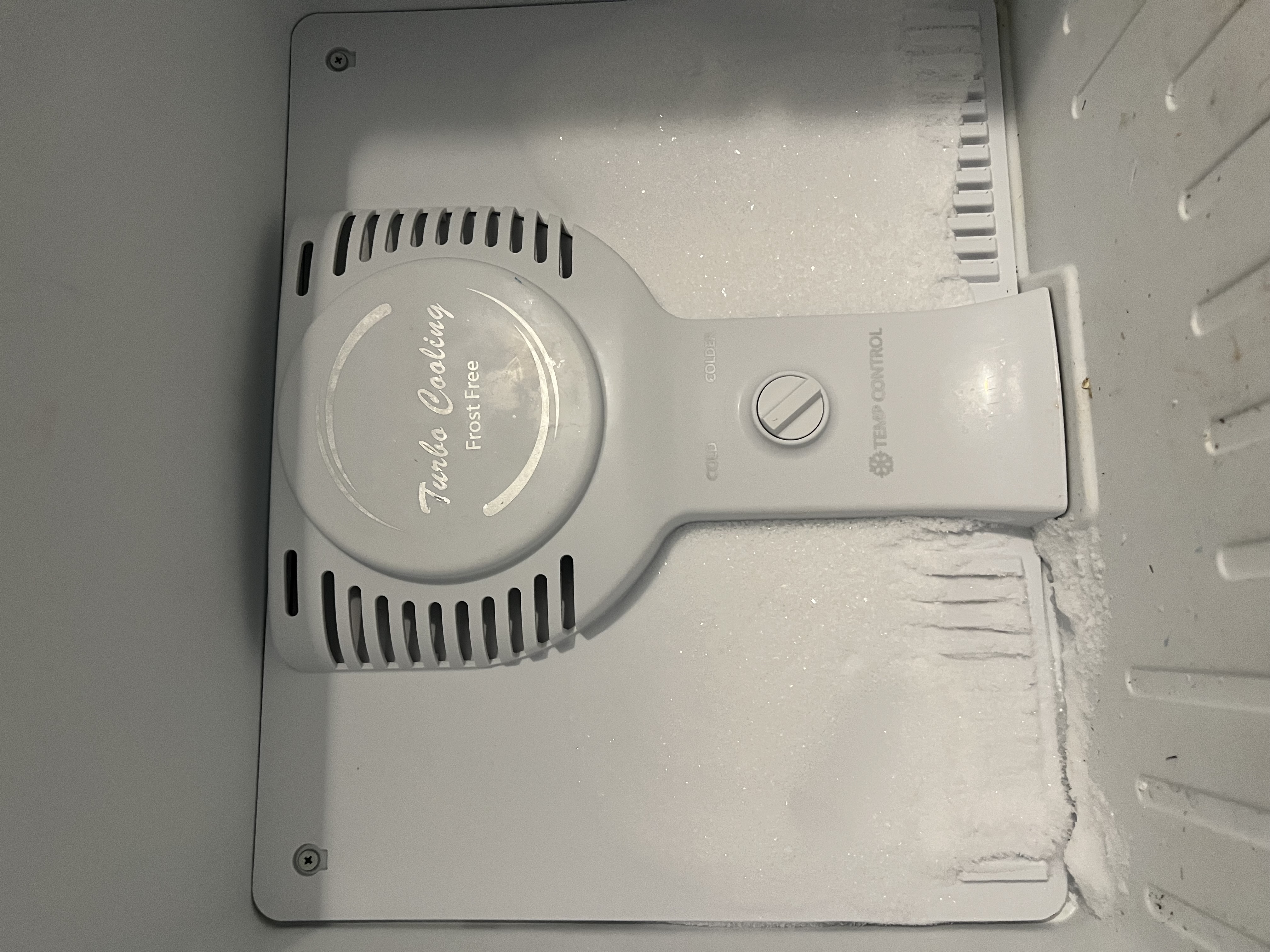 Severe frost on the rear freezer wall and vents