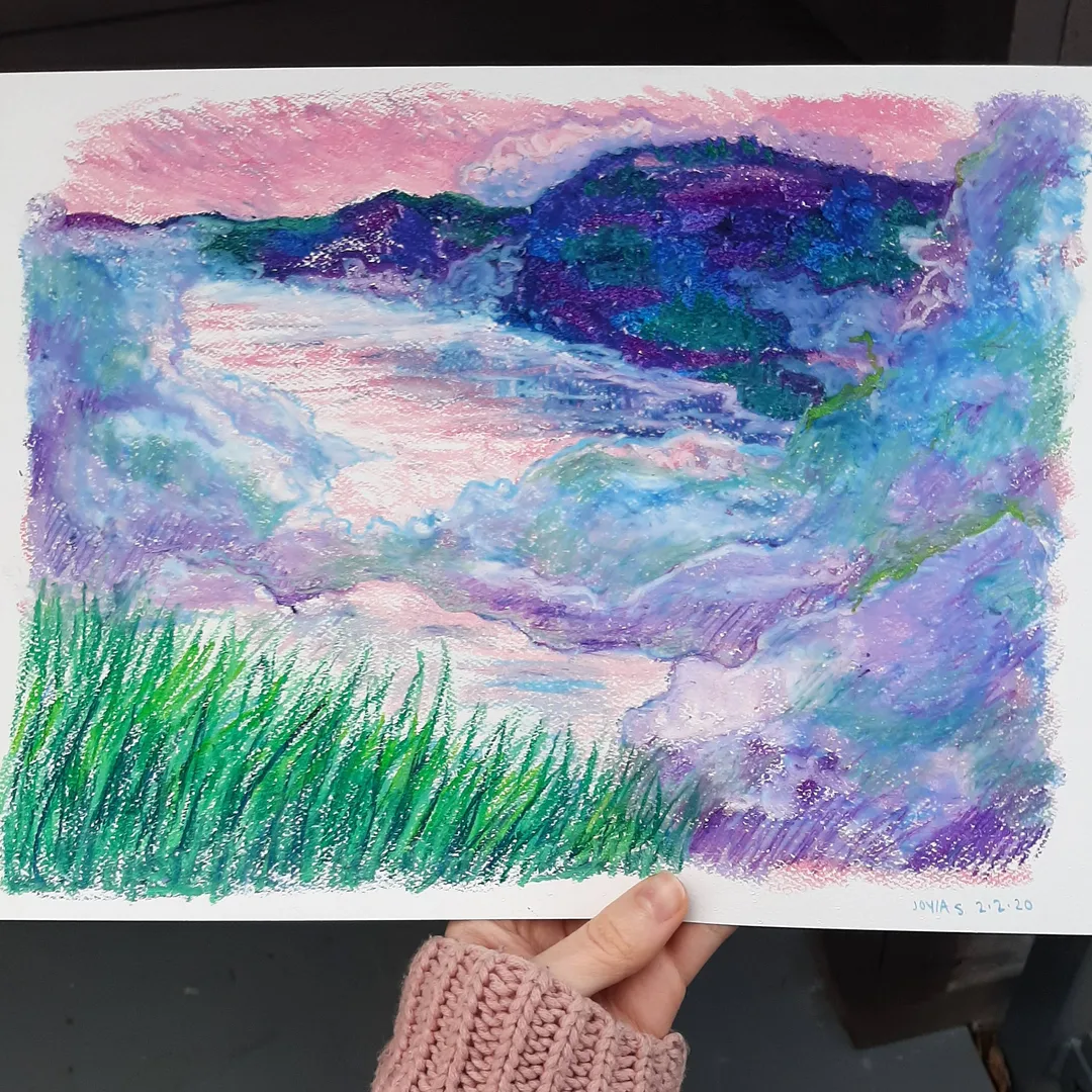 Oil pastel painting looking down over blue and purple fog, hills, and water with pink skies and vibrant green grass in the foreground.