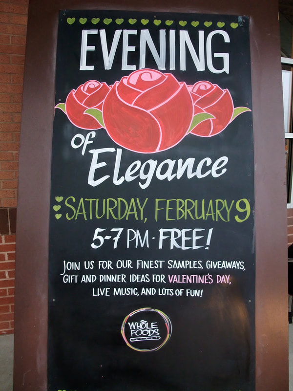Whole Foods chalkasaurus Valentine's Day chalk art