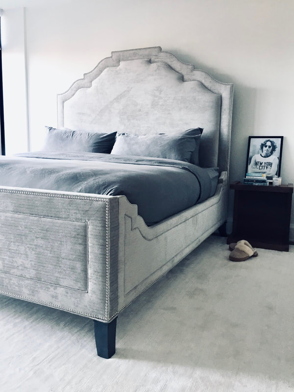 This bedroom bamboo silk rug from ABC Carpet & Home is beautifully proportioned under the Safavieh Couture bed and the Design Within Reach bedside table and gives that luxurious feeling when you step out of bed in the mornings