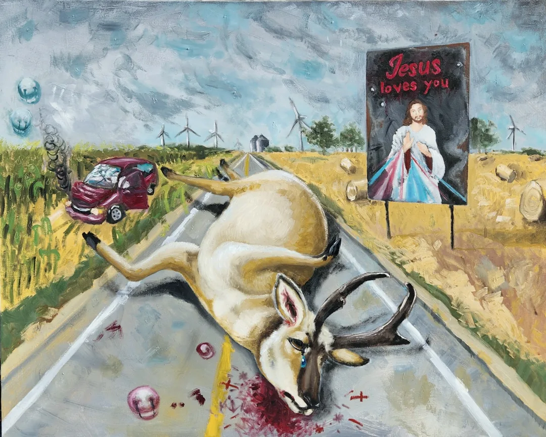 Painting of a very large pronghorn dead on a highway, crashed car in corn field to the left, and to the right is a hay field with rolls of hay decorated with a large 