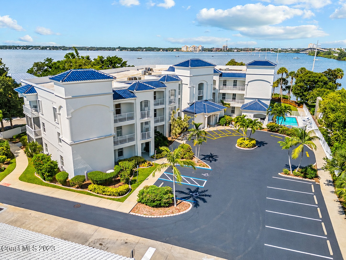 Aerial view of The Anchorage condominium community beside the water