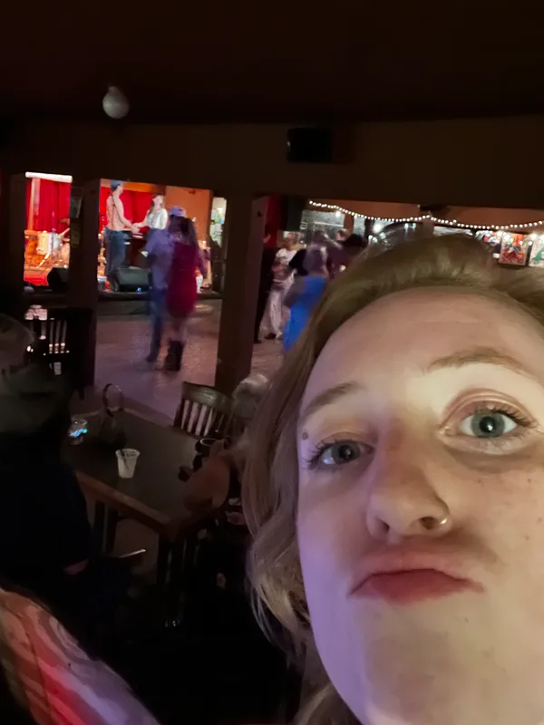 Lydia appears too close in the corner of an awkward selfie taken from the sound booth at Sagebrush in Austin, TX