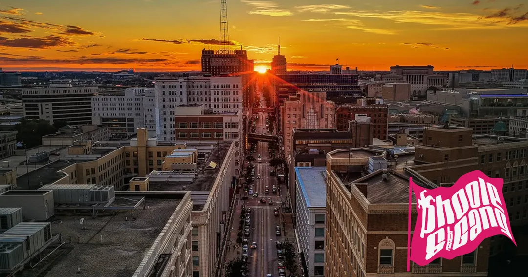 MILWAUKEEHENGE 2026. Twice each year, near the spring and autumn equinoxes, the setting sun aligns with downtown Milwaukee’s east–west street grid. On 23 Sep 2026, it dropped directly down Wisconsin Avenue. Actual photograph by Aaron Johnson, not AI.