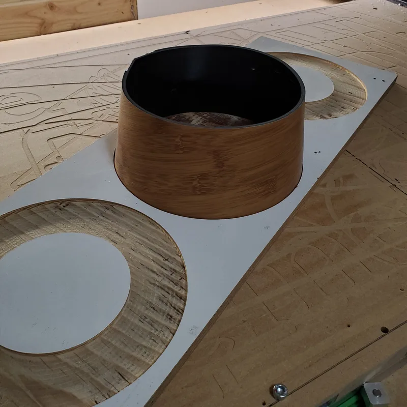 cnc router cut fixture for casting concrete made of curved vinyl and plywood