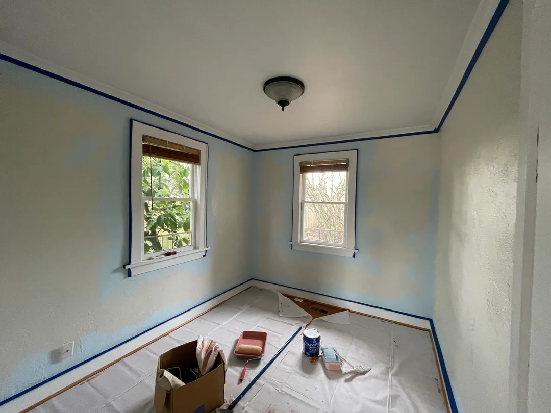 updating wall paint to neutral light blue that will last through the growing years