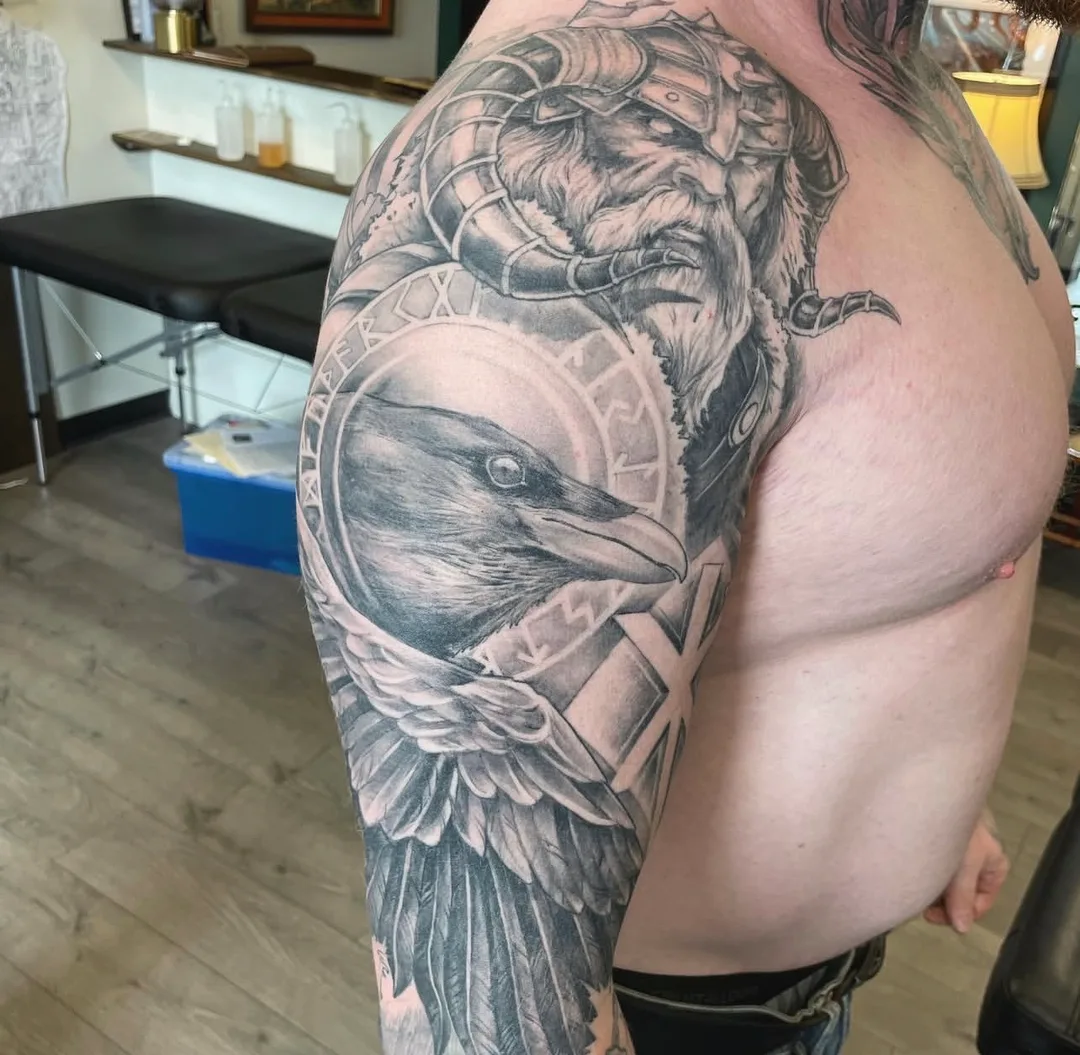 Black and grey realism Viking crow tattoo