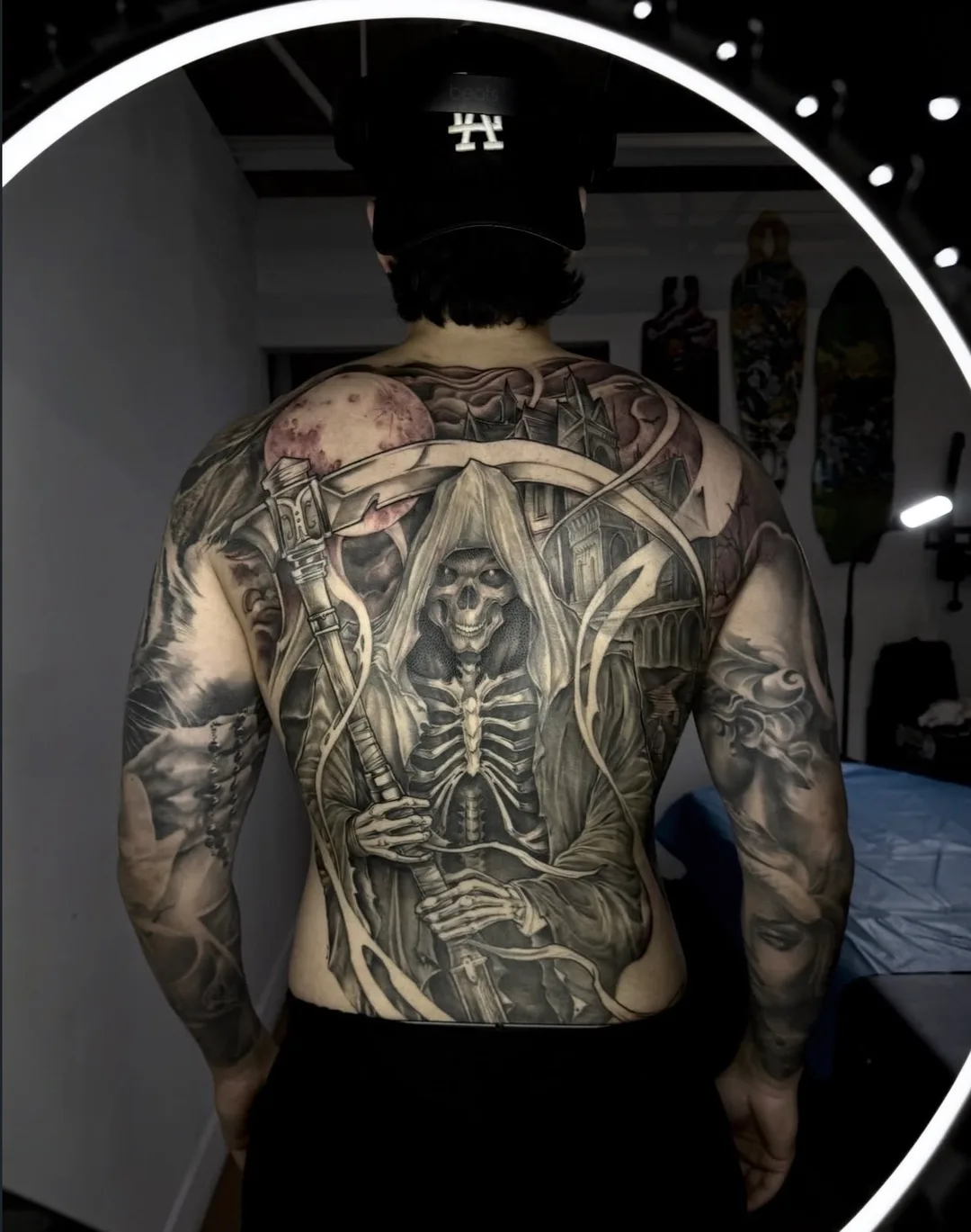 Black and grey realism reaper back tattoo
