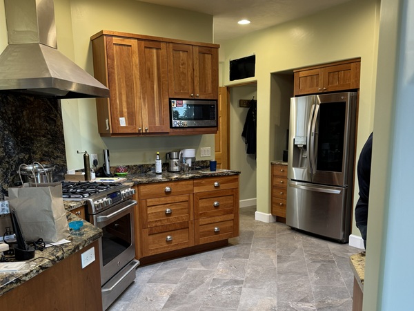 Kitchen update in Eldorado at Santa Fe featuring modern porcelain tile flooring, and fresh paint. Quality craftsmanship and attention to detail in every detail