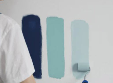 Image showing paint color comparison on  a wall meant to describe contractor  paining services in Santa Fe NM area