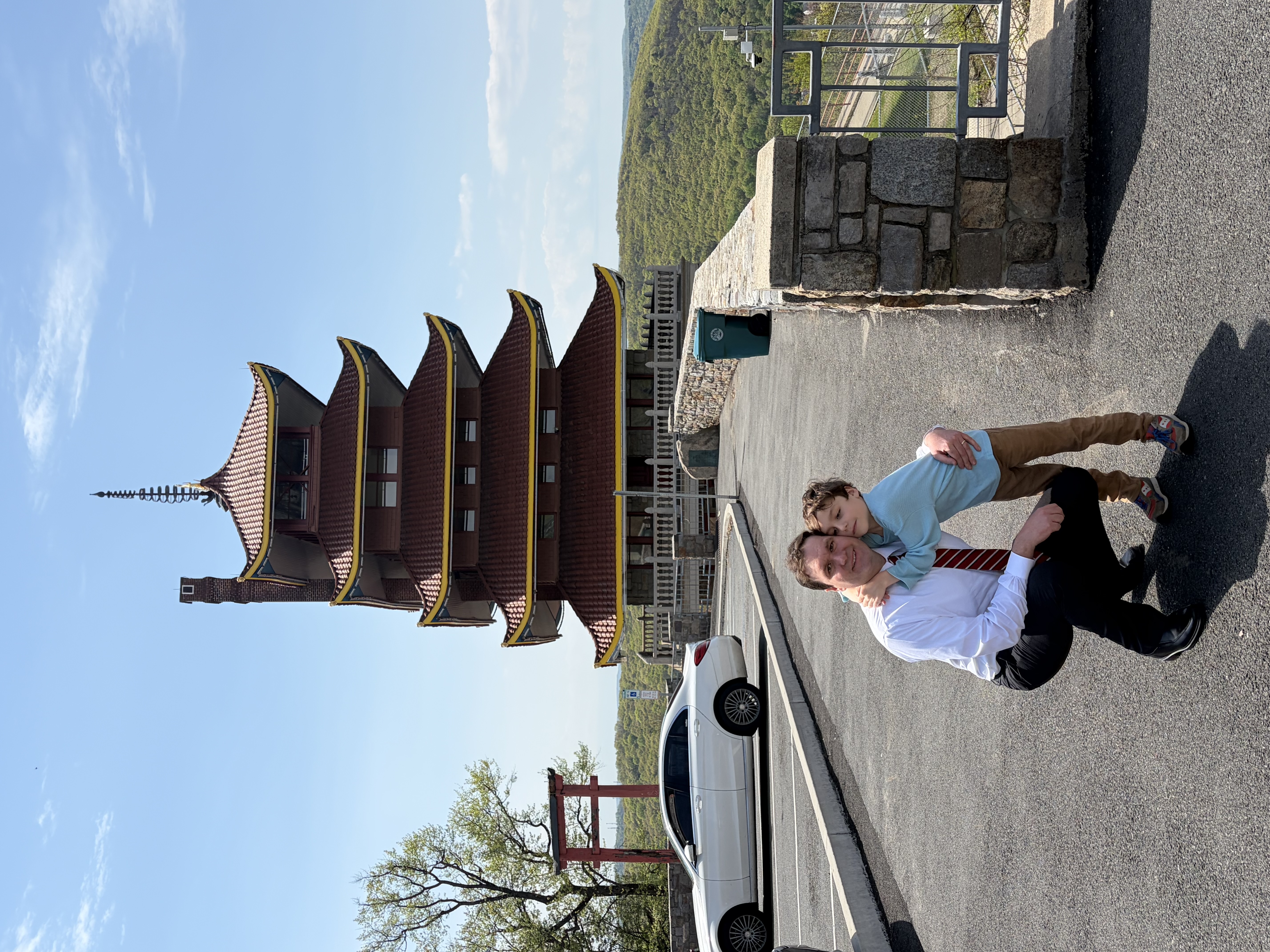 Gavin Roddy, PA and VT principal and teacher, with his son outside of the Reading Pagoda. 