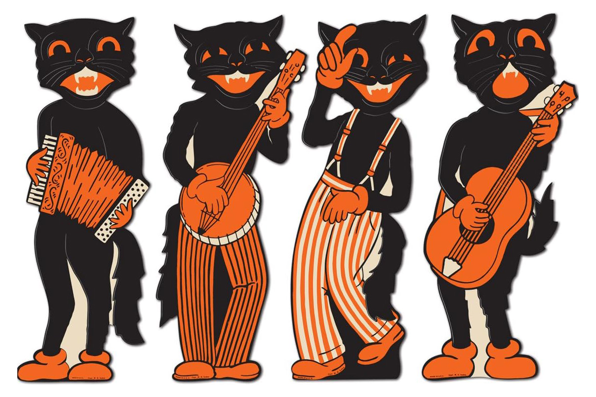 Four vintage Halloween black cat cutouts playing musical instruments.