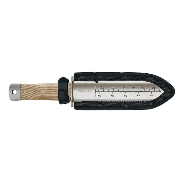Hori Hori knife, with sheath, on a white background.