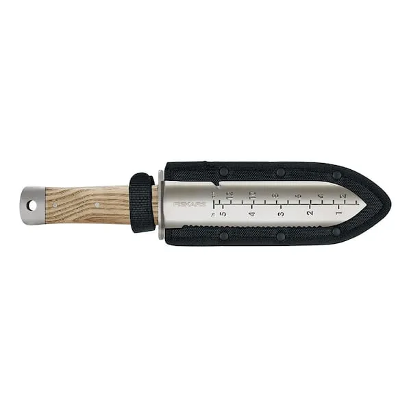 Hori Hori knife, with sheath, on a white background.
