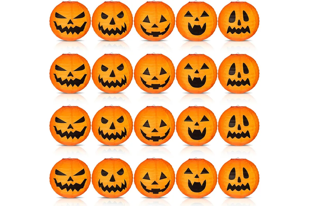 Orange jack-o’-lantern paper lanterns featuring five different vintage-inspired pumpkin faces.