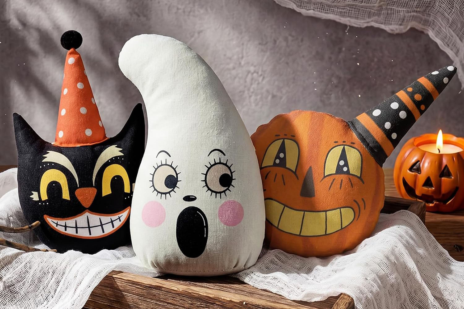 Three vintage-style Halloween bowl stuffers featuring a black cat, white ghost, and orange jack-o’-lantern.