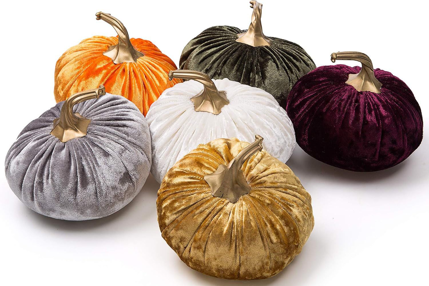 et of six small decorative velvet pumpkins in assorted sizes with realistic pumpkin stems.