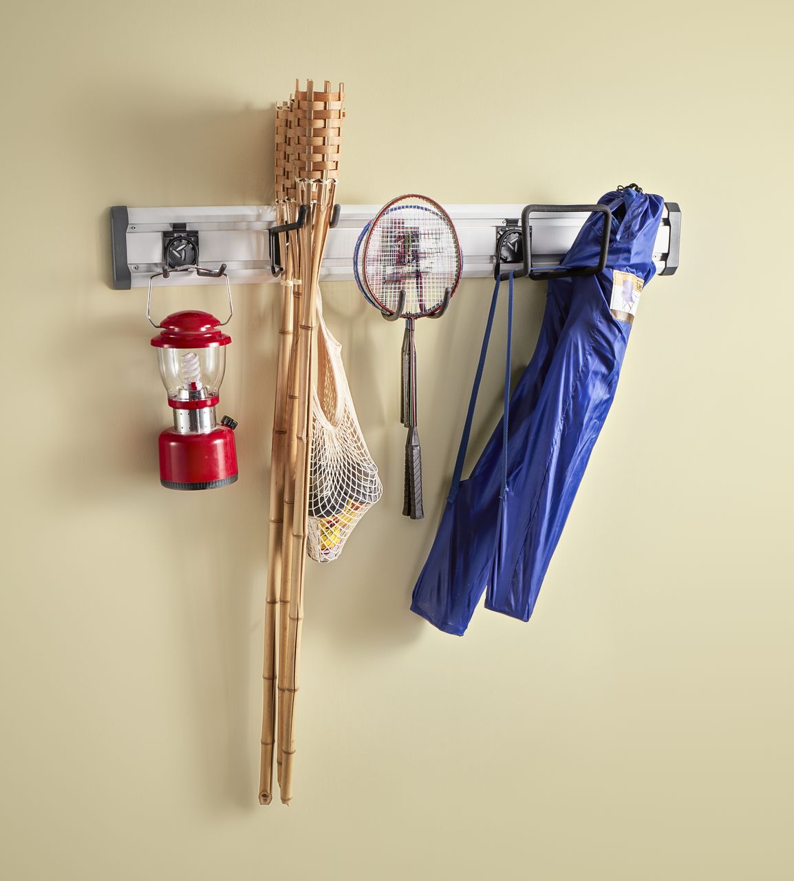 The wall mounted storage system on a wall with tools hu