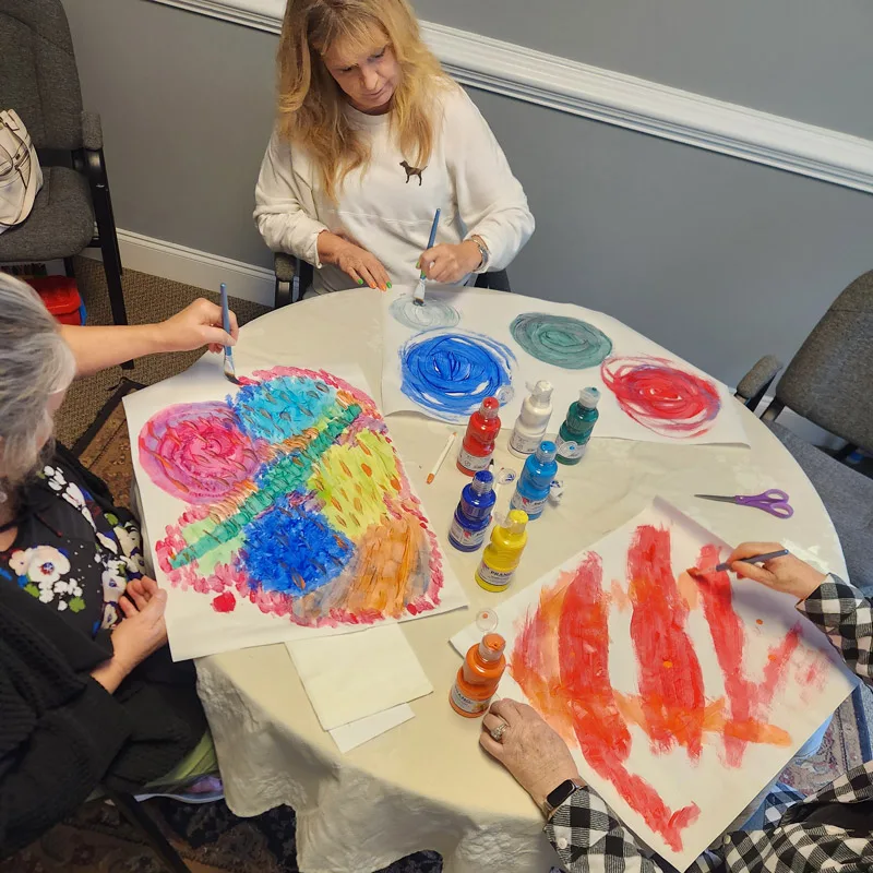 Group painting at Rooted Grace Studio
